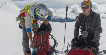 How to Attach Trekking Pole to Backpack